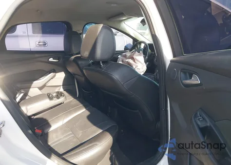 2014 Ford Focus Titanium from USA, damaged, VIN 1FADP3N25EL264660